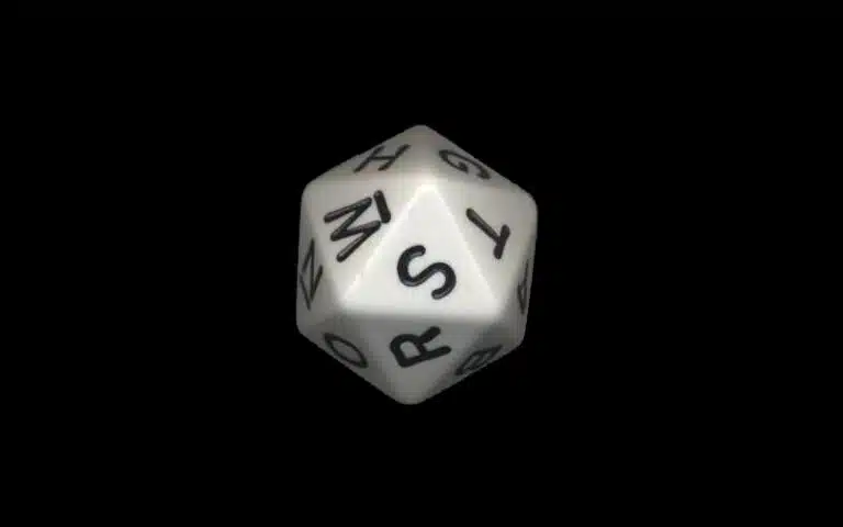 A 20-sided Scattergories dice (die) sits against a black background